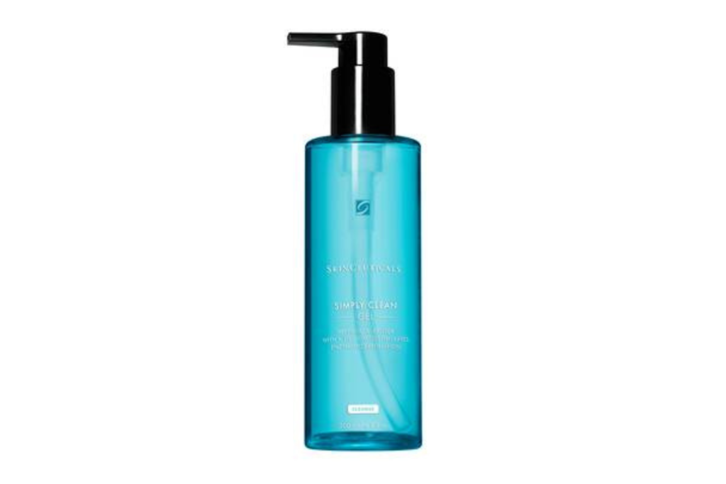 A display of SkinCeuticals Simply Clean gel cleanser with other select skincare items, designed to deeply cleanse and exfoliate for a radiant complexion.